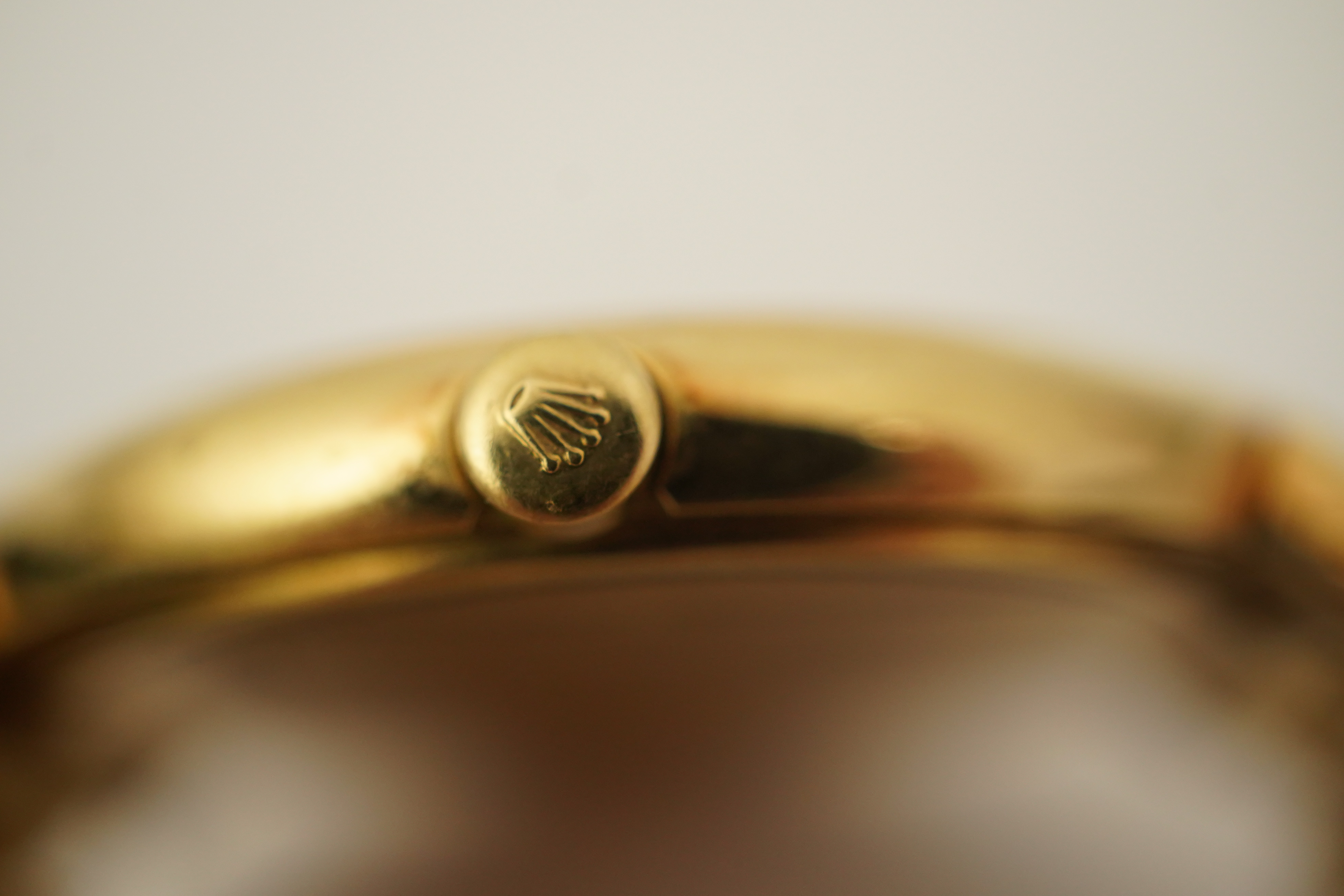 A gentleman's 1990's 18ct gold Rolex Cellini quartz dress wrist watch, on an 18ct gold Rolex brick link bracelet, with deployment clasp